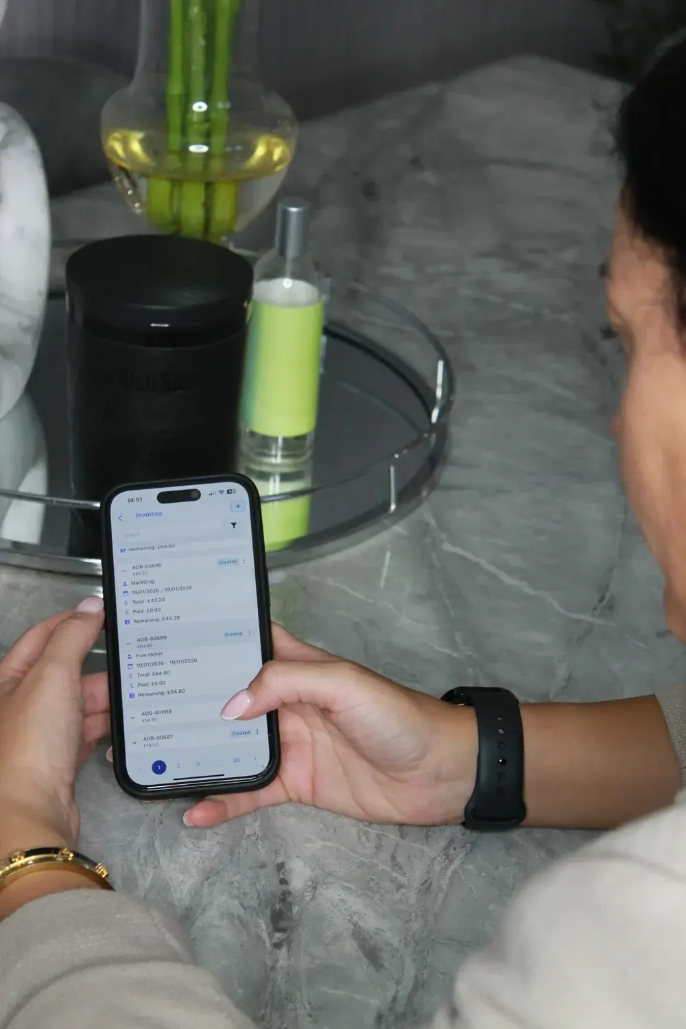 The MyT Management app open on a phone